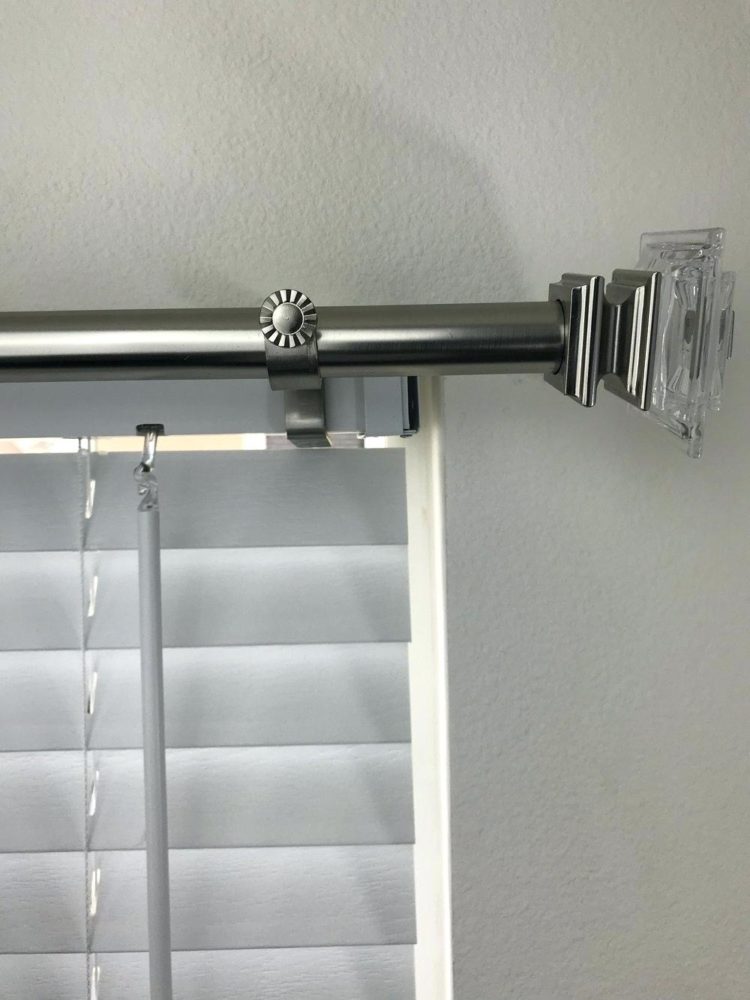 curtain rod brackets pulling out of wall