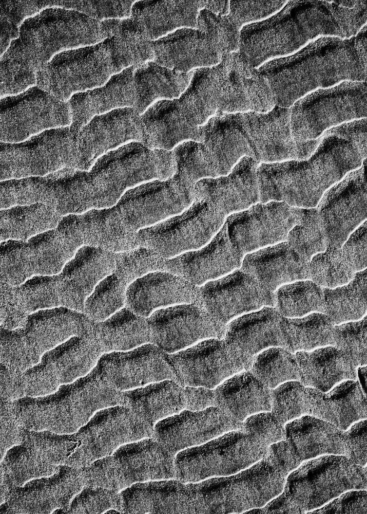 wavy dark sand texture