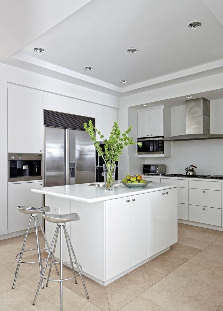 white kitchen cabinets light floor
