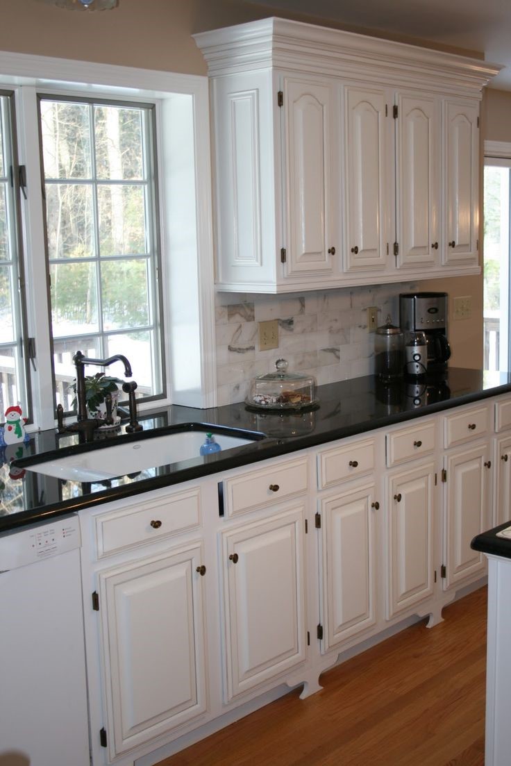 white kitchen cabinets light grey walls