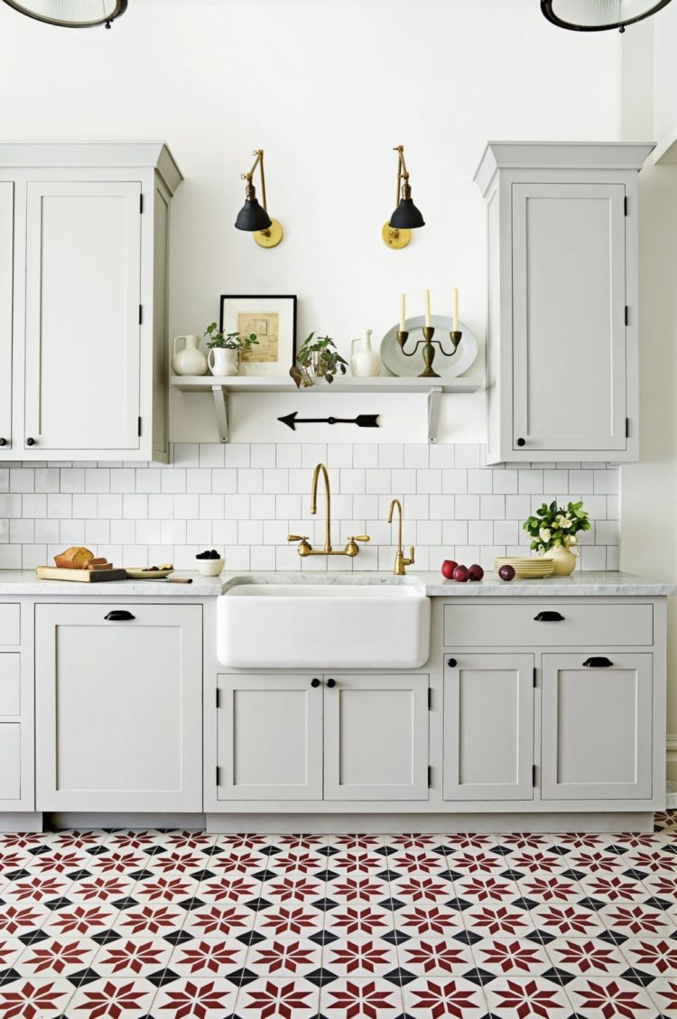 white kitchen cabinets light wood floor