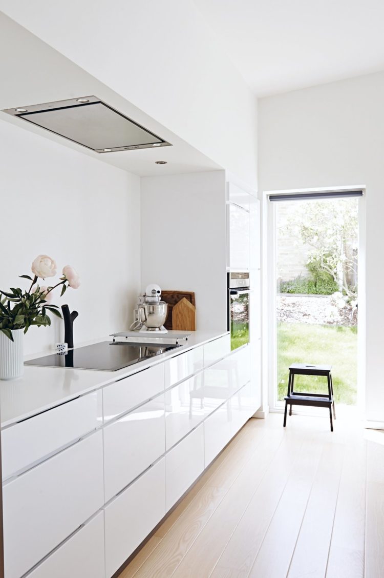 white kitchen cabinets navy island