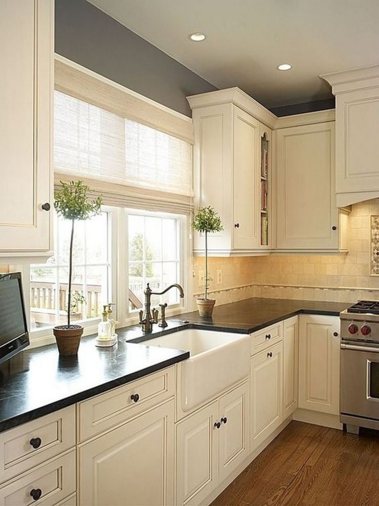 white kitchen cabinets with black granite countertops images